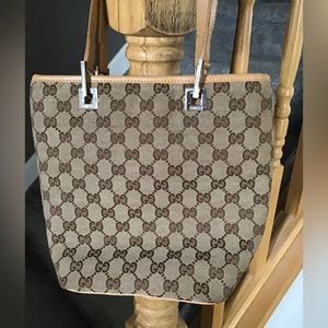 Gucci small tote. ( A Free Gift is included in your purchase!)